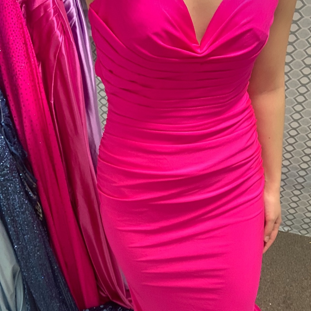 Hot pink prom dress size 4 with pleated top and sewn in bra pads
